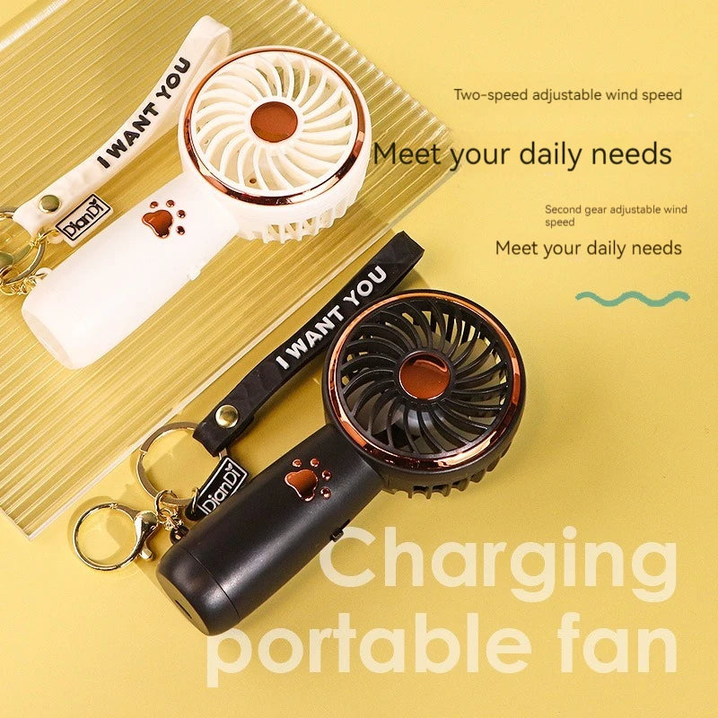 A summer new mini fan cute cartoon portable charging usb handheld student outdoor fan