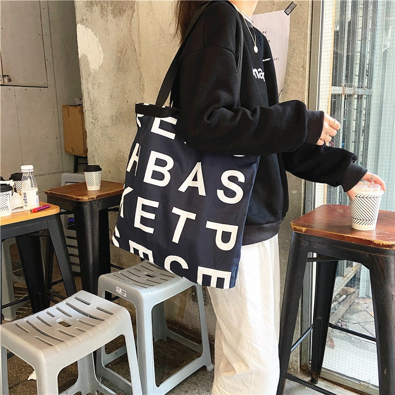 PURDORED 1 Pc Women Large Letter Shopping Bag Canvas Handbag Tote Messenger Casual Female Shoulder Bag Reusable Tote Bolsa