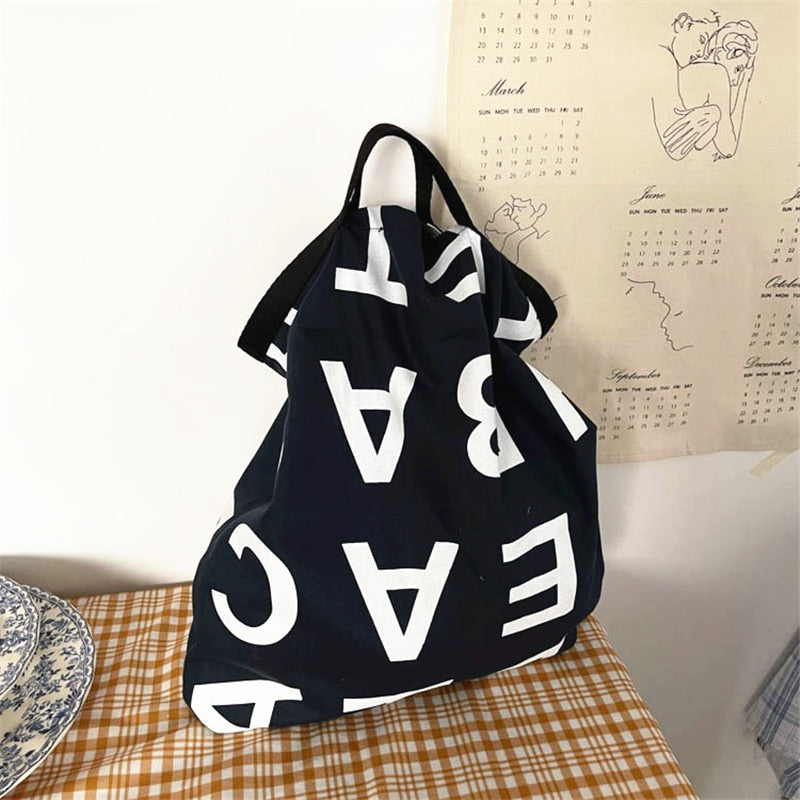 PURDORED 1 Pc Women Large Letter Shopping Bag Canvas Handbag Tote Messenger Casual Female Shoulder Bag Reusable Tote Bolsa